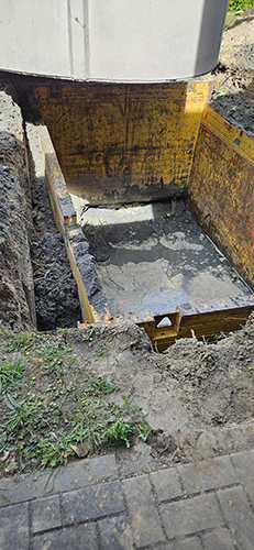 regenwaterput in graven sleuf bekisting